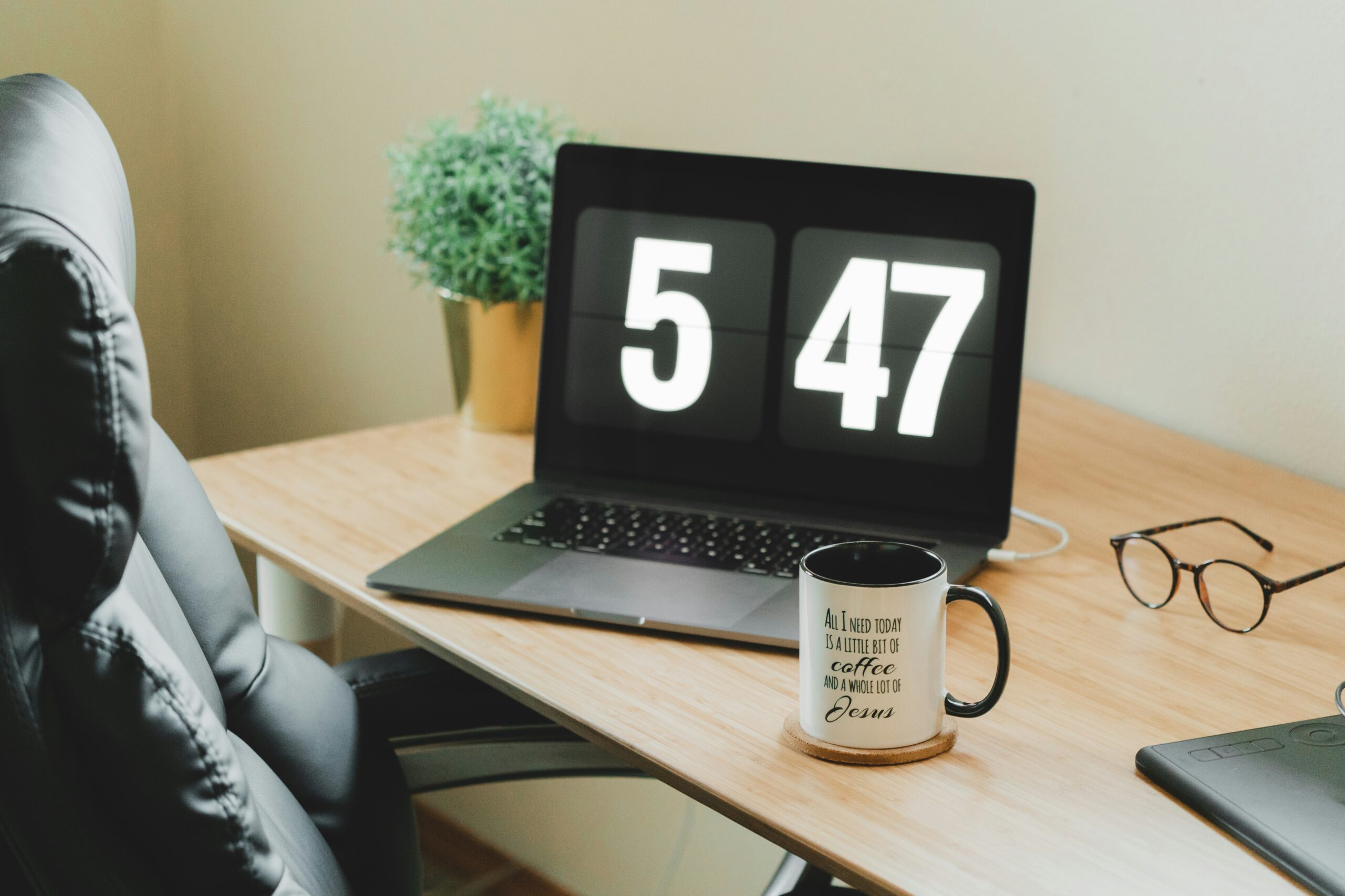 how much money do I need to retire by age - retirement savings calculator on laptop screen - Photo by Cristofer Maximilian on