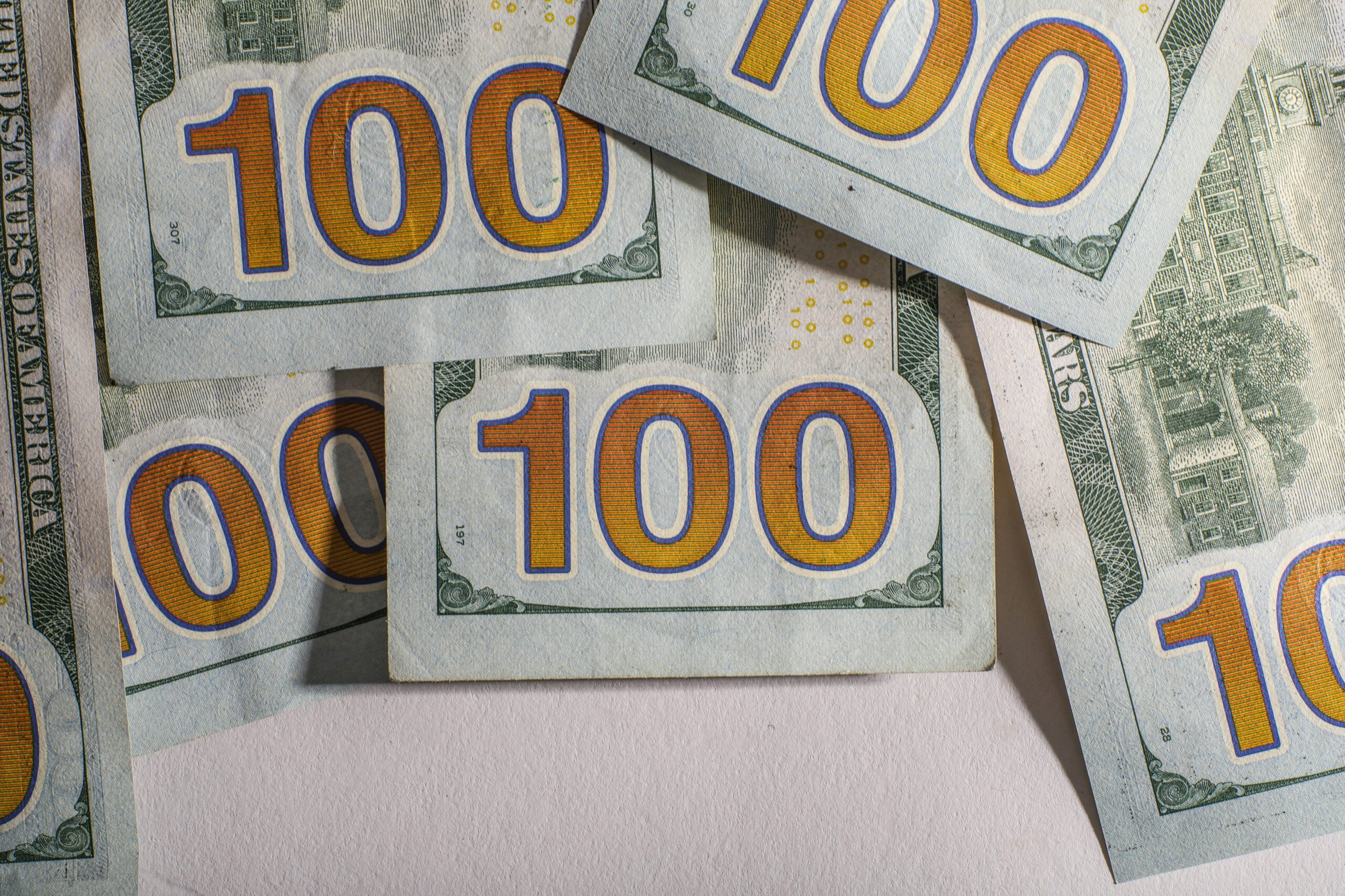 saving money bills - Photo by Giorgio Trovato on Unsplash